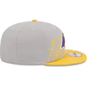 new-era-flat-brim-9fifty-draft-edition-2023-los-angeles-lakers-nba-grey-and-yellow-snapback-cap