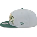 lippikset-littea-harmaa-snapback-9fifty-tip-off-2023-milwaukee-bucks-nba-new-era