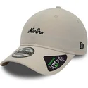 lippikset-kaareva-beige-saadettava-nauha-9twenty-repreve-heritage-script-new-era