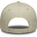 lippikset-kaareva-beige-snapback-dorado-e-frame-metallic-outline-new-york-yankees-mlb-new-era